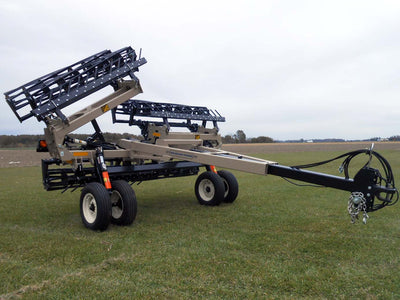 Remlinger 40'9" Working width, stack folding, angled tooth bar, 6'+5' wing extensions, gauge wheels, 18' transport